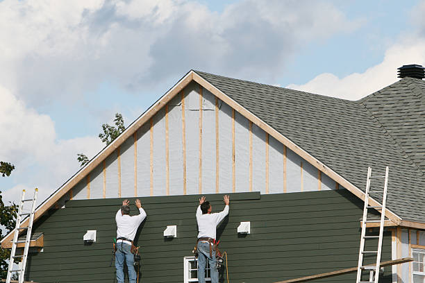 Professional Siding technician working in Tappahannock, VA